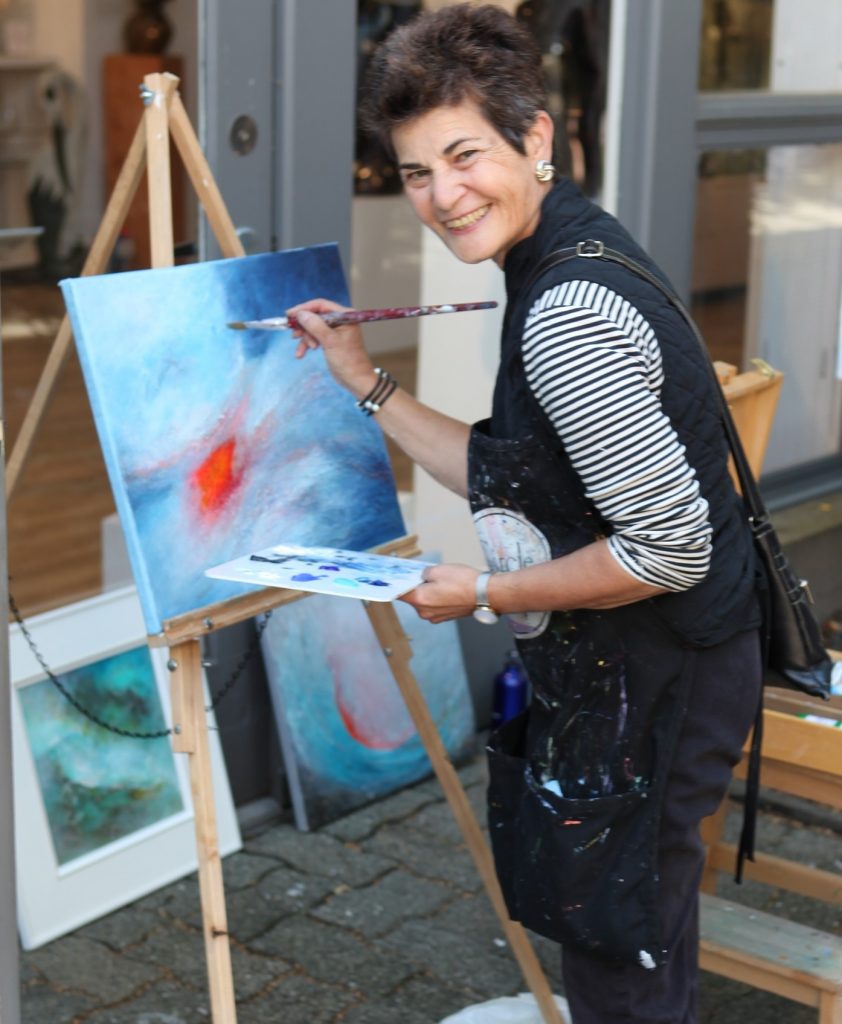 Moniza.painting outside